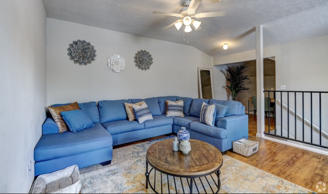 a loft area with a couch